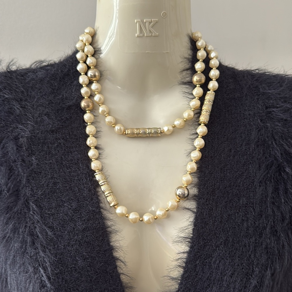 Vintage costume pearl necklace with golden log and round spacers. Made in Korea.